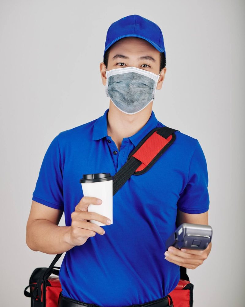 cheerful-courier-with-cup-of-coffee-1.jpg